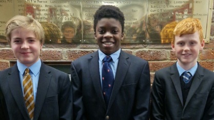 Three boys in ties and jackets